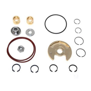 Set of mechanical parts including washers, rings, and bearings on a white background